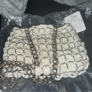 Small white and silver bag, very detailed NV used with tags,